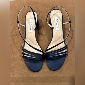 Nina New York women’s navy blue slingback evening mid-heel slip on sandal.